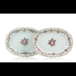  A pair of scalloped armorial serving platters