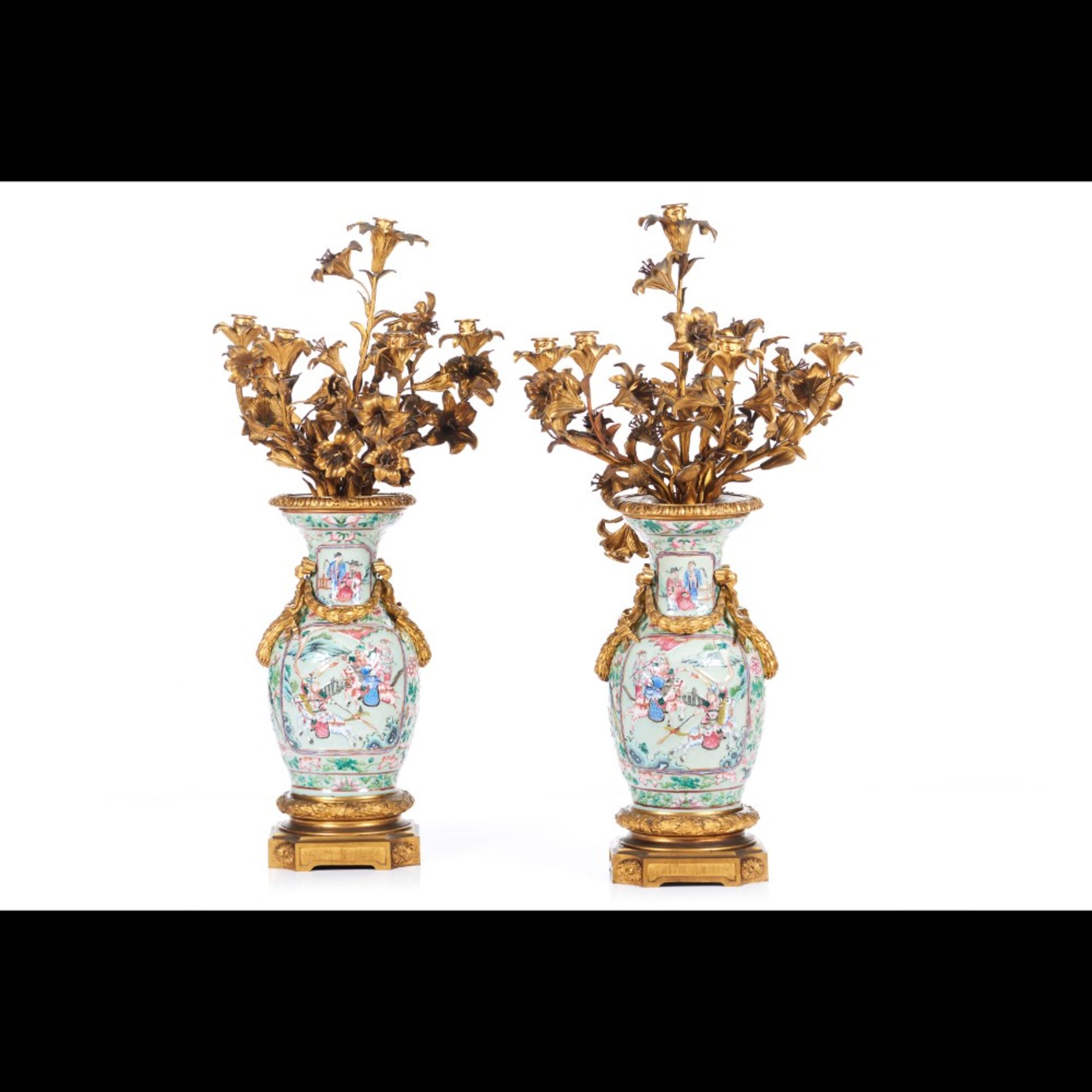  A pair of seven branch candelabra