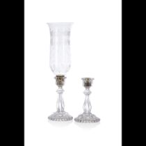 A pair of crystal and glass candlesticks