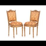  A pair of Louis XVI style chairs