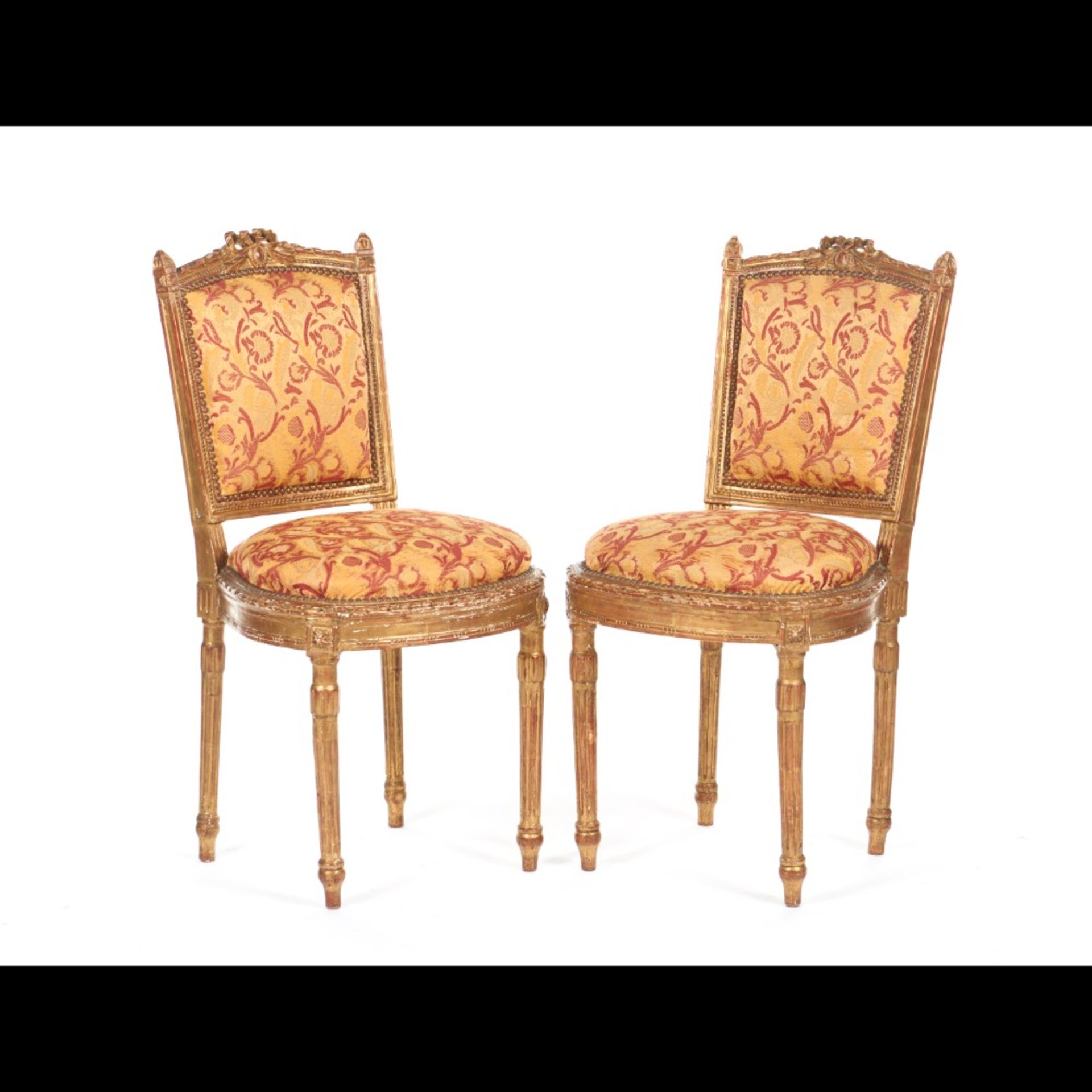  A pair of Louis XVI style chairs