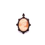 Antique pin/pendant with shell cameo and garnets