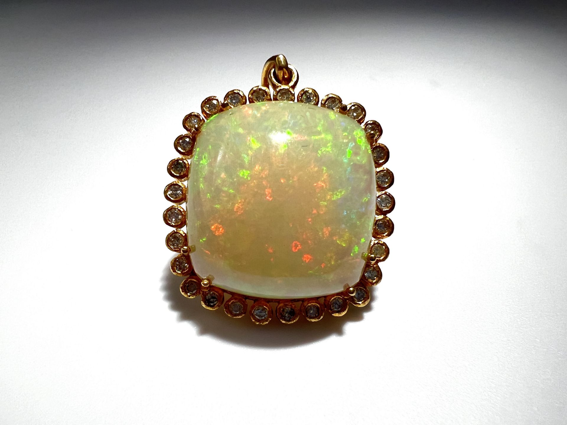 Opal pendant with diamonds