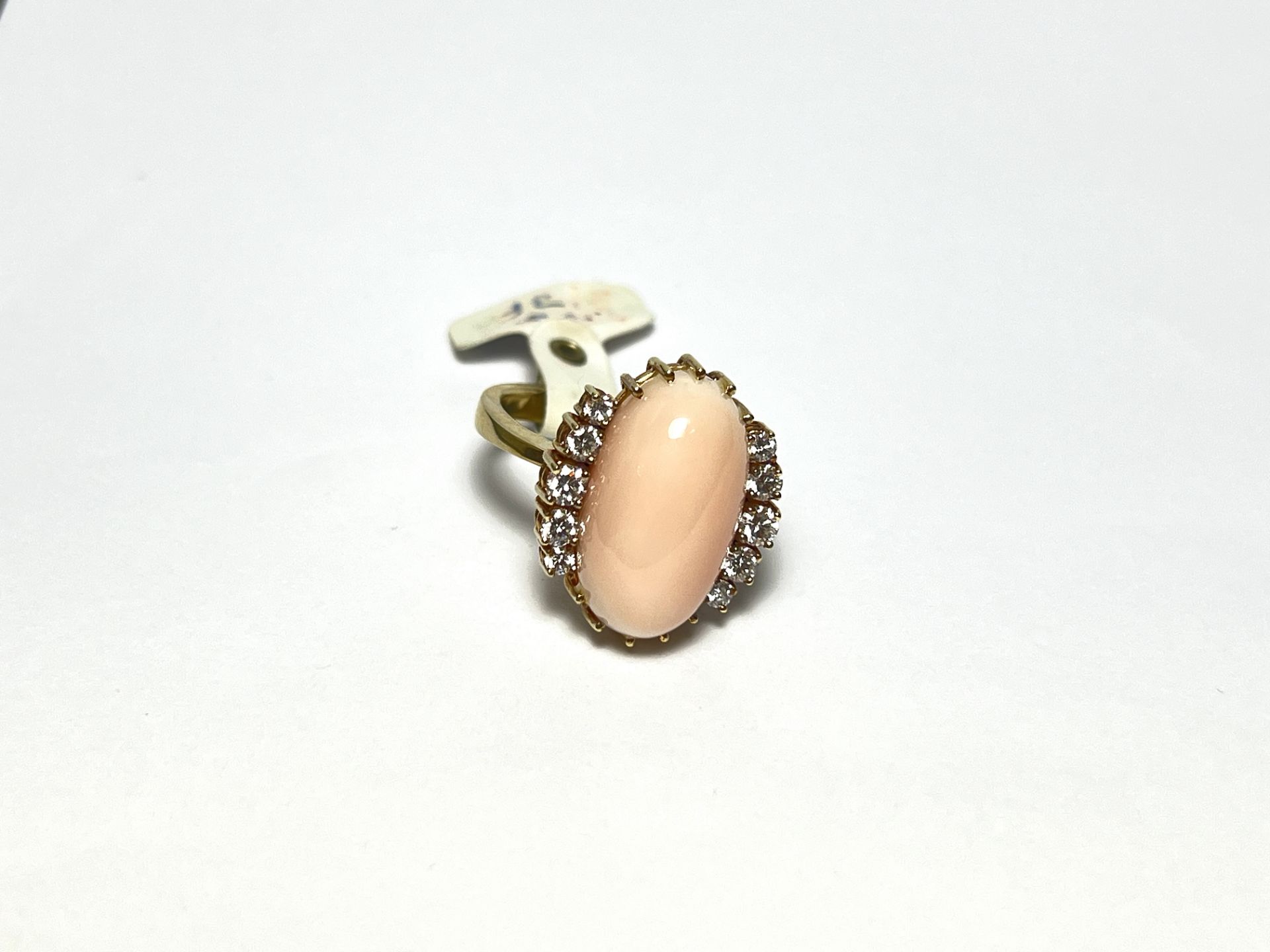 Coral ring with diamonds