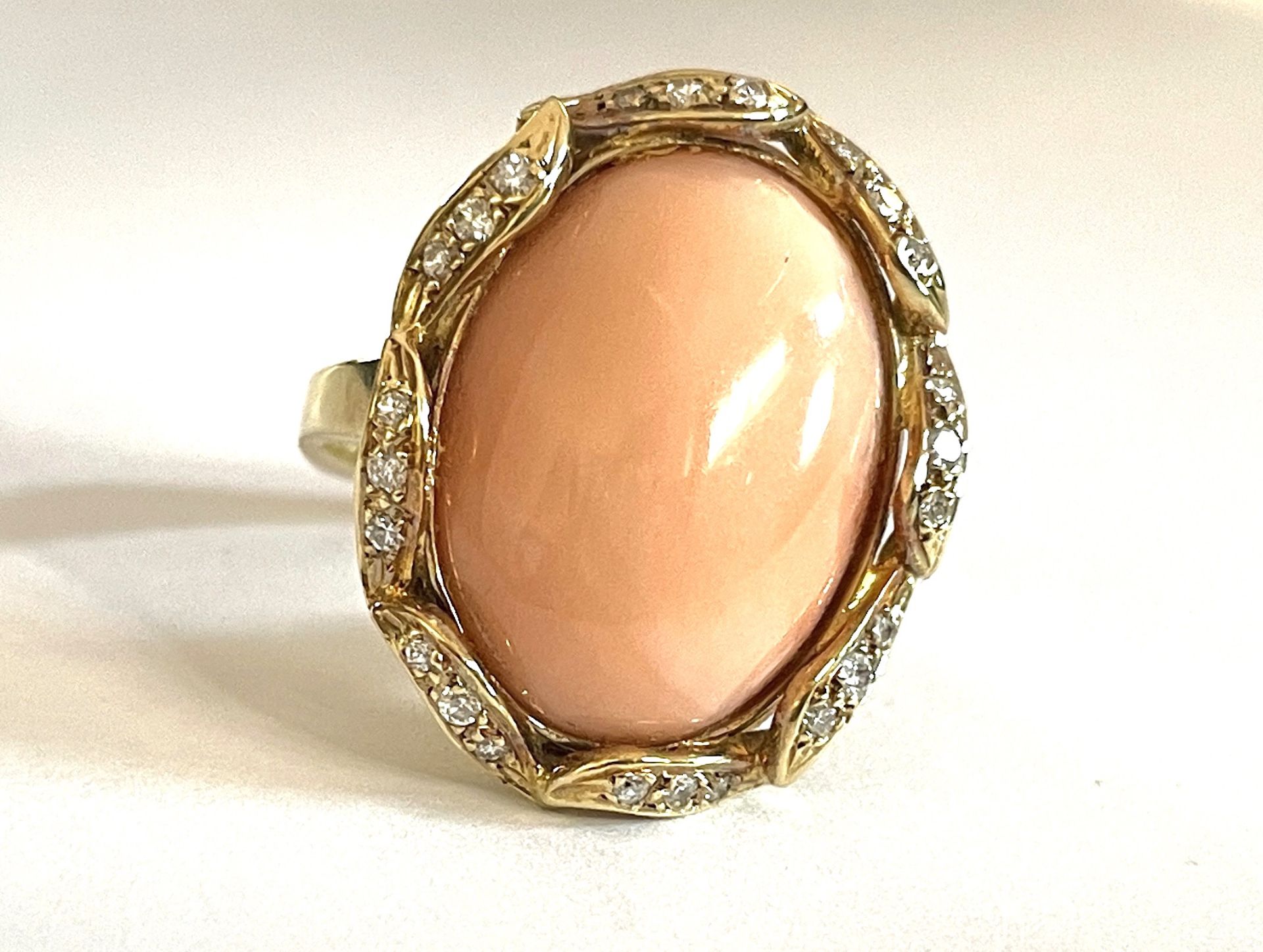 Coral ring with diamonds