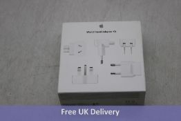 Three Apple World Travel Adapter Kits. Box damaged