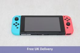 Nintendo Switch 32GB, with Neon Red & Blue JoyCons. Used, no box or accessories