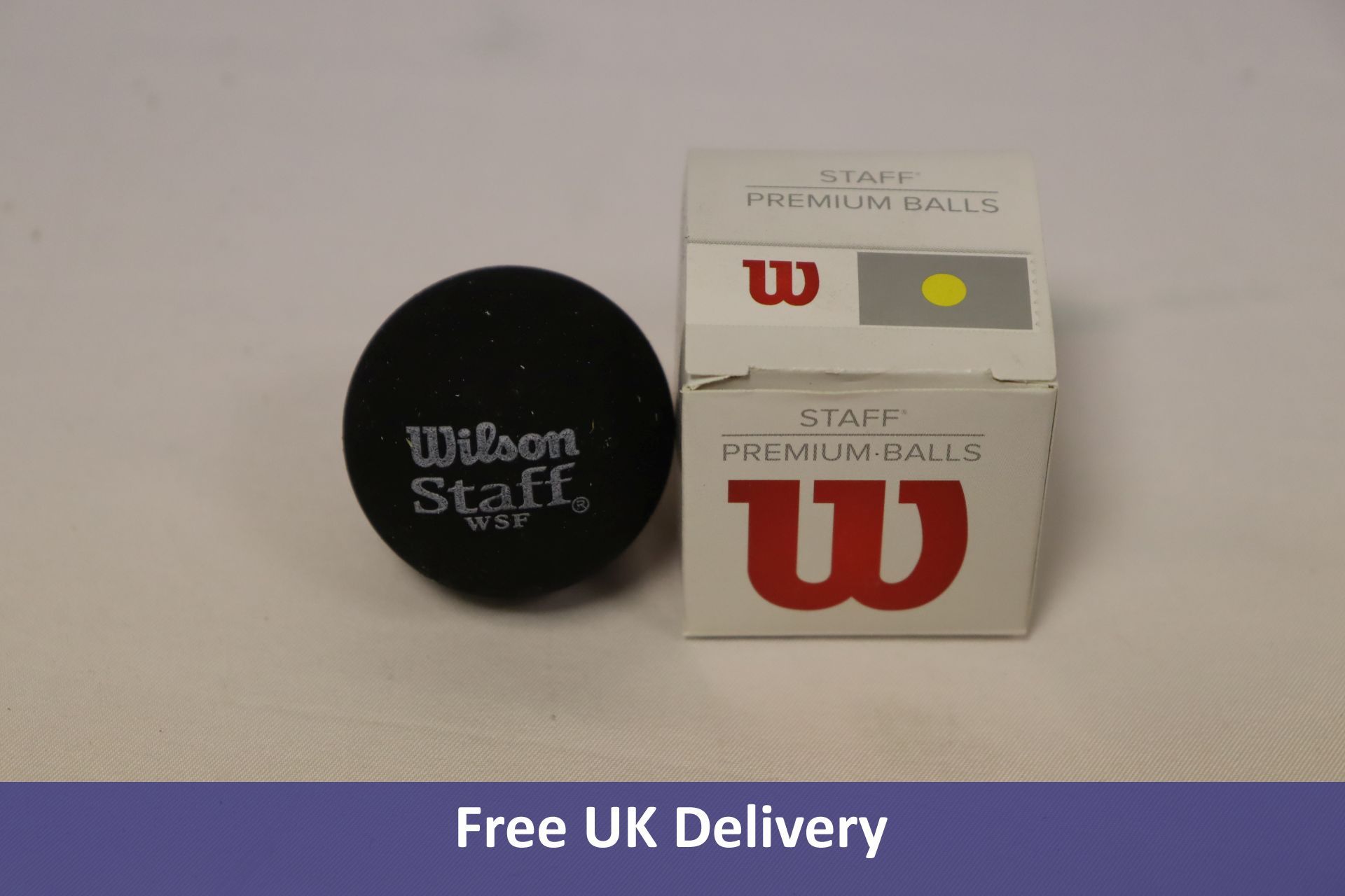 Thirty-five Wilson Single Yellow Dot Balls, Slow
