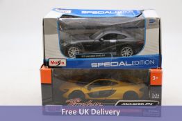 Two Model Cars to include 1x McLaren P1 Yellow, and 1x Mercedes Benz AMG GT Black. Box damaged