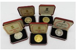 Five Assorted IoM Silver Crowns