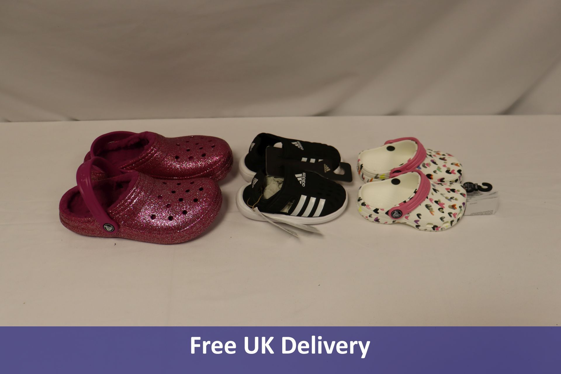 Three Pairs of Childrens Slides to include 1x Adidas Water Sandal, Black/White, UK 7, 1x Crocs Class