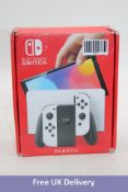 Nintendo Switch Console, 64GB OLED, White Joy-Cons. Used, tested okay, some minor marks. Boxed with