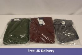 Three Reebok items to include 1x Train Sup Tee, Grey, XXL, 2x Rift Jogger, 1x Red, 1x Green, Medium