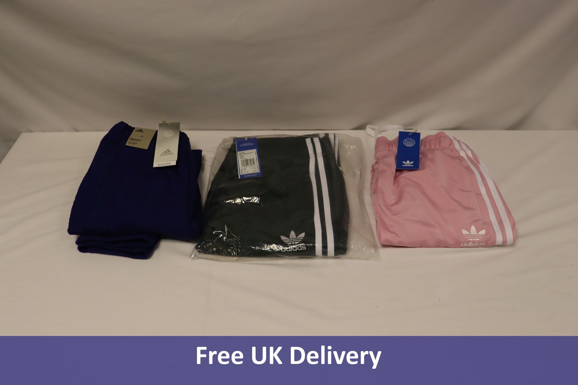 Three Adidas items to include 1x Boy's Badge of Sport Fleece Trousers, Blue, 7-8y, 1x Girl's Adicolo