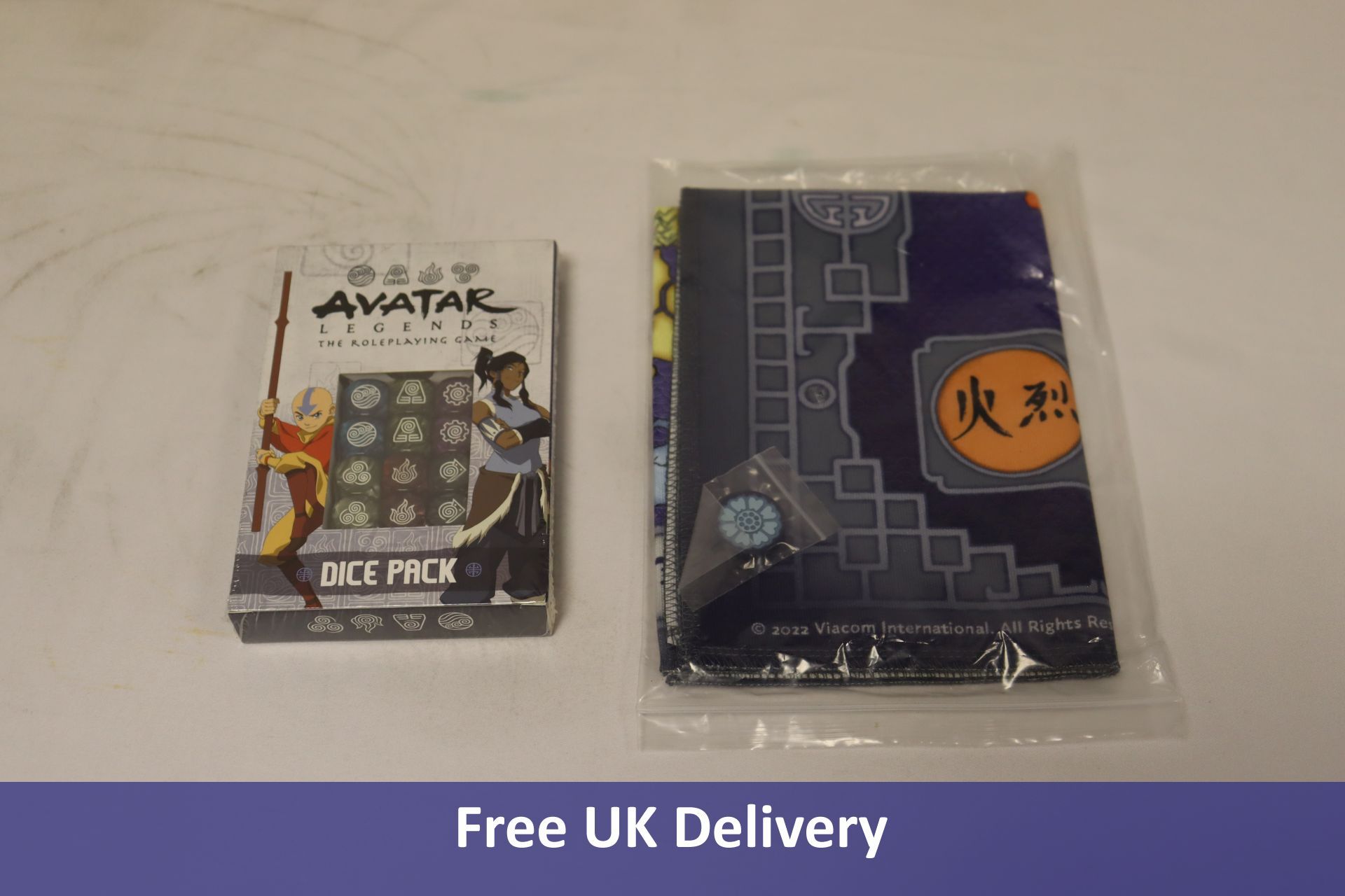 Avatar Legends items to include 2x Four Nations Cloth Map and Pai Sho Tile, 2x Dice Bags, 2x Combat