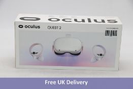 Oculus Quest 2 VR Headset with two controllers. Used, reset, boxed with UK charger, some minor box d