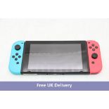 Nintendo Switch, 32GB, Neon JoyCons. Used, no box or accessories. Many screen marks, kickstand missi