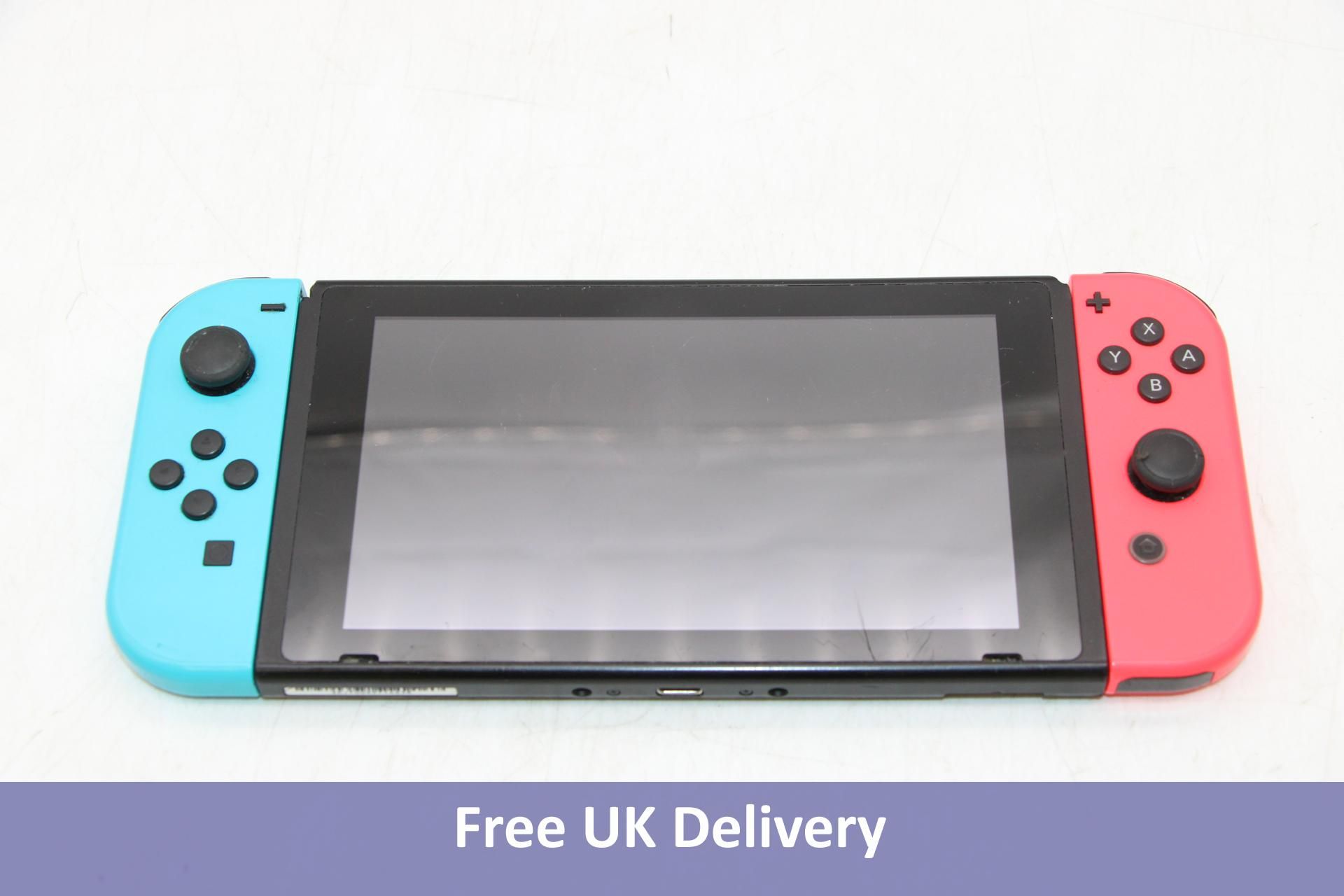 Nintendo Switch, 32GB, Neon JoyCons. Used, no box or accessories. Many screen marks, kickstand missi