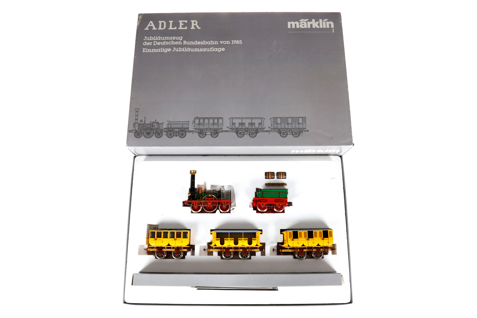 Märklin Adler-Zug 5751, Spur 1, elektr., mit Lok, Tender, 3 Wagen und Figuren, Alterungsspuren,