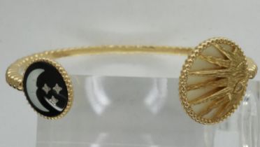 CHRISTIAN DIOR: Victoire De Castellane for Dior Rose Celest bangle, tested 18ct gold, with sun and