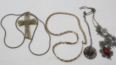 Four mixed silver necklaces and pendant necklaces including a gilt silver example, largest chain