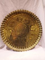 Large Middle Eastern brass tray bearing portraits, D: 48 cm. UK P&P Group 3 (£30+VAT for the first