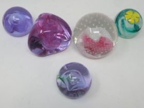 Five Caithness paperweights including Pebble, Moon Crystal, (2), Buttercup, and Champagne. UK P&P