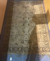 Polychrome woollen rug with floral design and tassels to each end, 119 x 175 cm. Not available for