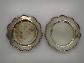 A pair of hallmarked silver trays, each D: 10 cm, combined 105g. UK P&P Group 1 (£16+VAT for the