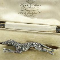 Unmarked gold greyhound form brooch set with rose cut diamonds, L: 47 mm, 4.1g. UK P&P Group 0 (£6+