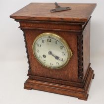 19th Century French oak cased mantel clock, chiming on a gong, working at lotting. Not available for