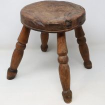 Elm seated milking stool with four splayed legs. Not available for in-house P&P