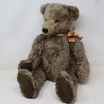 Mid 20th century German grey plush bear with jointed head, arms and legs, no visible maker. UK P&P