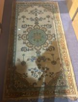 Polychrome woollen rug with Aztec design, 97 x 180 cm. Not available for in-house P&P