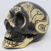 Contemporary decorated bronze skull, H: 10 cm. UK P&P Group 1 (£16+VAT for the first lot and £2+