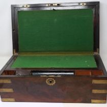Early 19th century walnut cased writing slope, with fitted interior and brass bound corners, 45 x 25