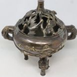 Large 20th century Chinese bronze censer with pierced cover, decorated throughout with vines and
