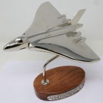 Chrome Avro Vulcan bomber on a wooden base, H: 18 cm. UK P&P Group 2 (£20+VAT for the first lot