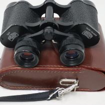 Carl Zeiss Jena Jenoptem 8x30 binoculars in a leather case. UK P&P Group 2 (£20+VAT for the first