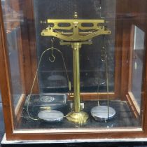 Set of early 20th century mahogany cased scientific scales with weights, overall 36 x 26 x 49 cm