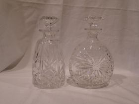 Two Stuart Crystal cut glass decanters with stoppers, each H: 22 cm. Not available for in-house P&P