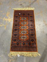 Red ground Belgian rug by Handmade Carpets Ltd, 69 x 153 cm. Not available for in-house P&P