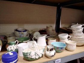 Shelf of mixed ceramics including Wedgwood. Not available for in-house P&P