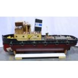 Radio controlled model tug boat, wood construction, electric twin motors and brass propellers, L: 80