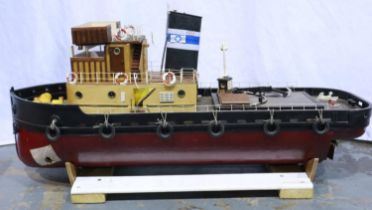 Radio controlled model tug boat, wood construction, electric twin motors and brass propellers, L: 80