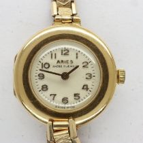 ARIES: ladies 18ct gold cased, 17 jewel wristwatch on a rolled gold bracelet, 21.4g, not working