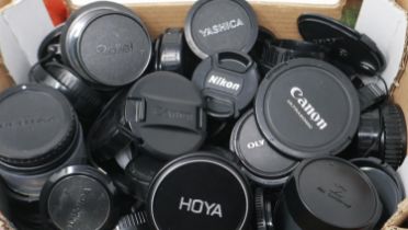 Large quantity of lens caps including Canon, Minolta & Yashica. P&P Group 1 (£14+VAT for the first