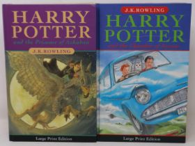 Two hardback first edition Harry Potter books, large print editions, Chamber of Secrets and Prisoner