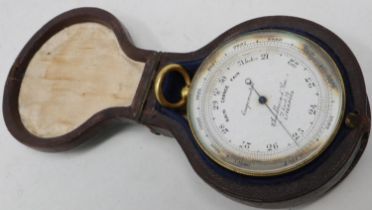 Chadburn & Son Liverpool brass cased pocket aneroid barometer with integral compass and silvered