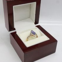 9ct gold ring set with marquise cut tanzanite and diamonds, size R, 2.6g. UK P&P Group 0 (£6+VAT for